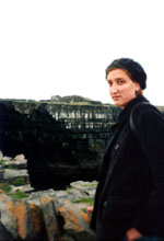 Black cliffs, black fort, scared girl.